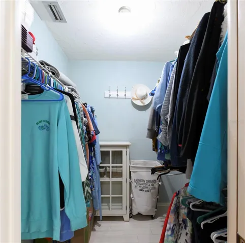 Dual walk in closets in primary bedroom suite