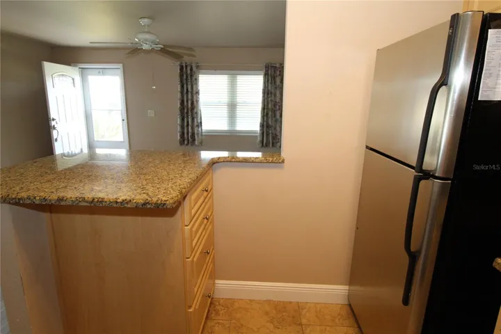Countertop is open to the living and dining areas, perfect place to gather.
