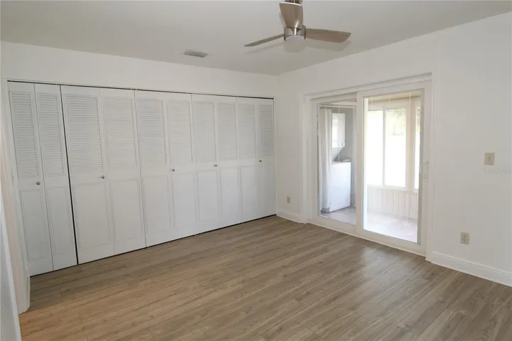 Bedroom closets and sliding doors to lanai.