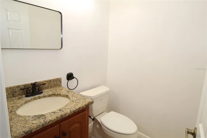 Half bath, clean and stylish.