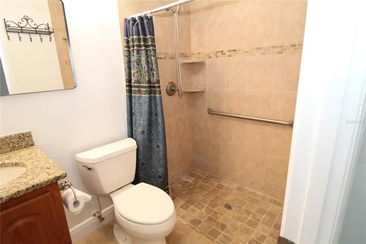Bath with roll in shower