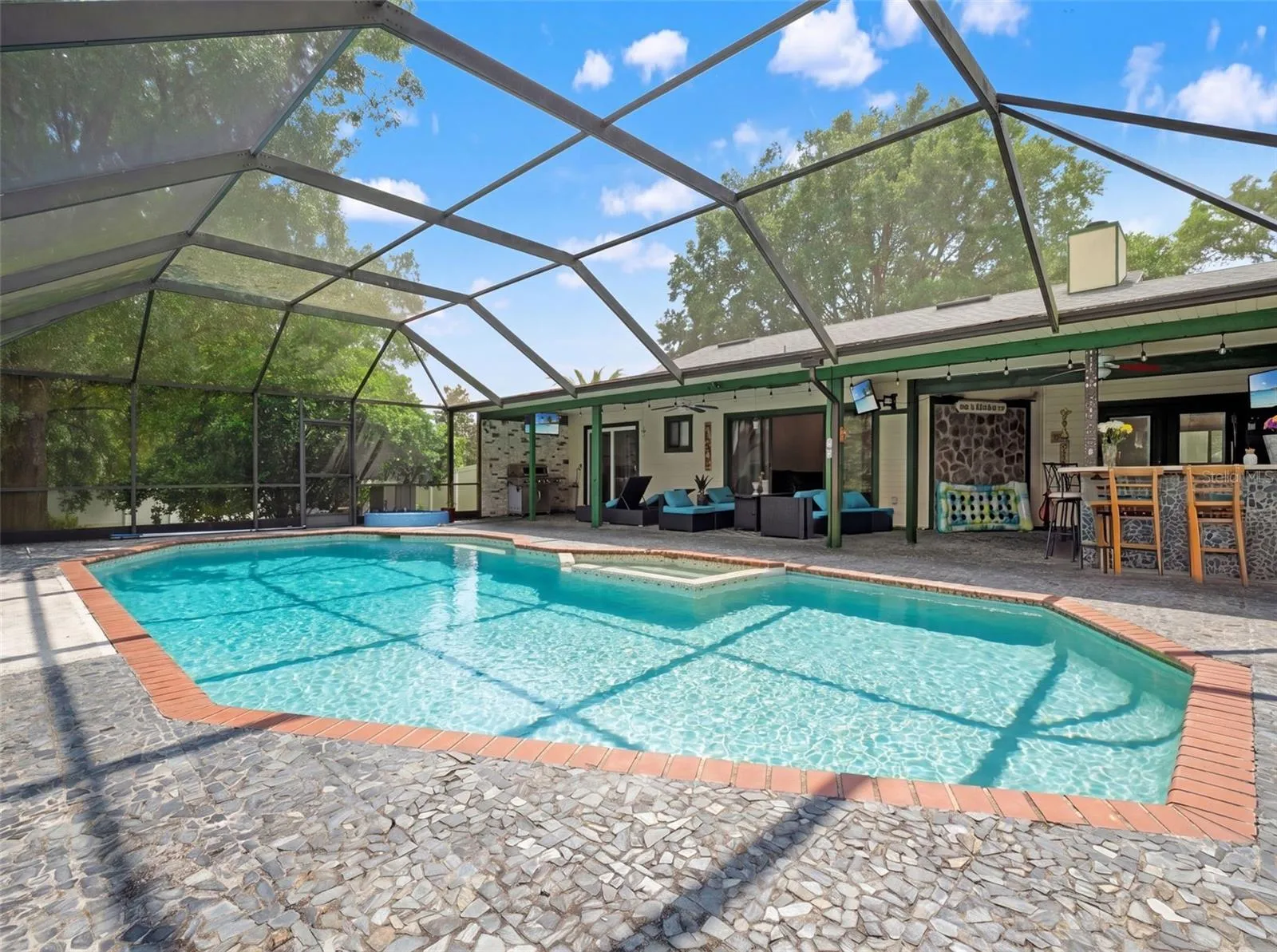 Resort - Style Pool, Spa andOutdoor Entertainment Area