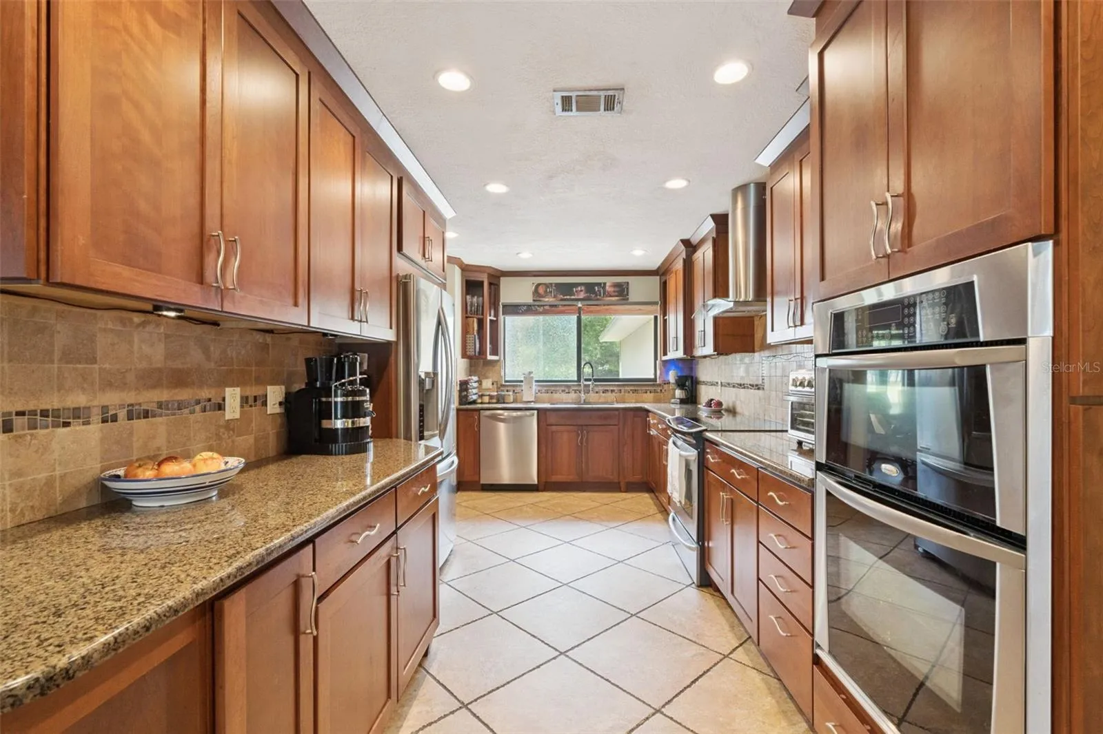 Updated Kitchen with Cherry Wood Cabinetry