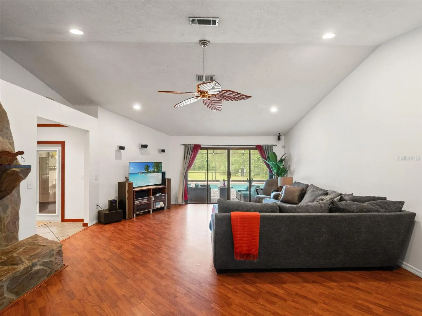 Expansive Family Room with Pool Views