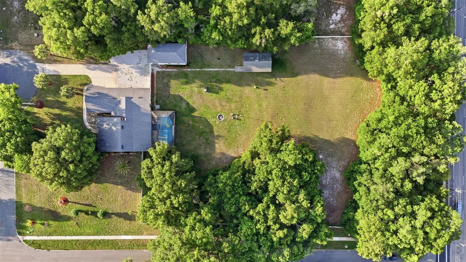 Overhead Aerial View of Main Home &amp; Backyard