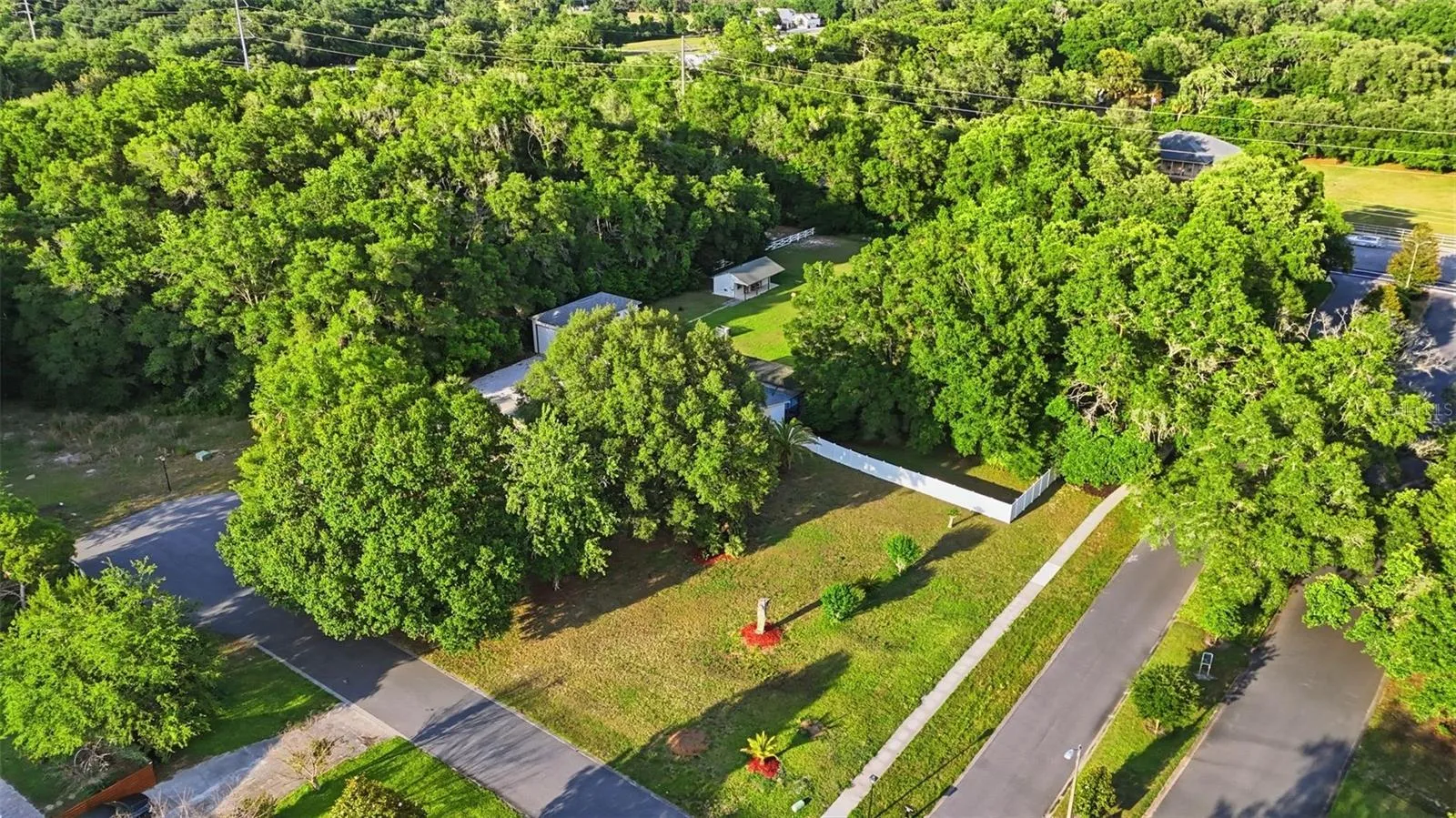 Aerial View of Front Entrance &amp; Fully Fence Grounds