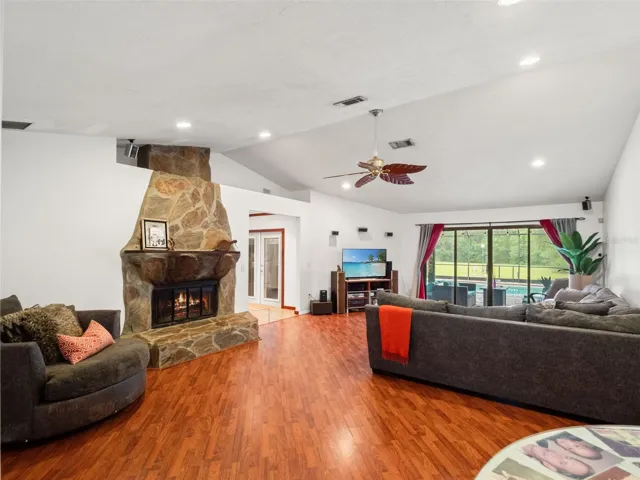 Expansive Family Room with Stone Fireplace