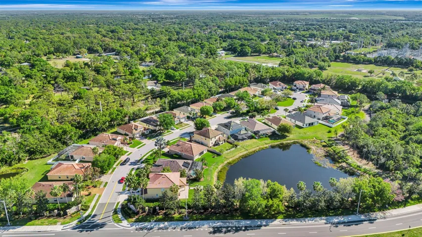Facing into neighborhood showing culdesac and preserve.