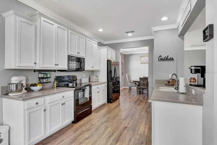 Another angle of kitchen facing into dining area.
