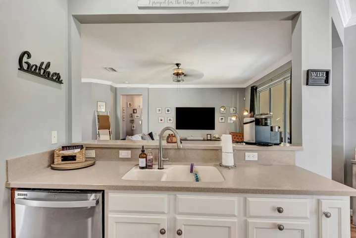 Kitchen over looking living area.