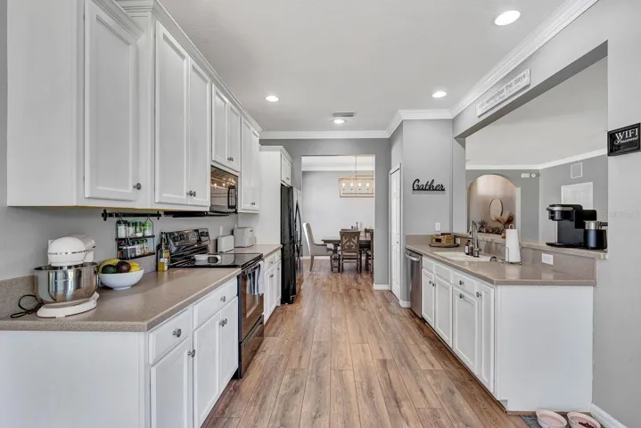 Kitchen view facing towards dining area.