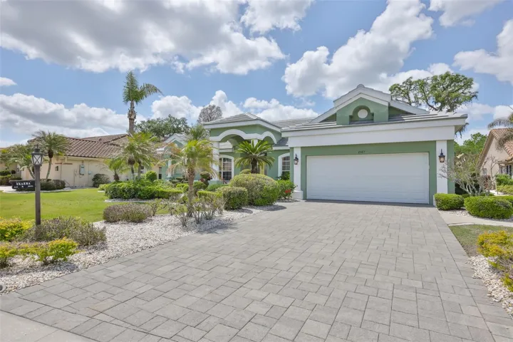 Executive style home located at the end of the Cul-De-Sac. Deep, pavered driveway allows for multiple guests with easy Floridian landscaping surrounding the lot.