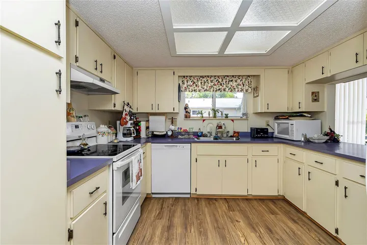KITCHEN FEATURING PLENTY OF CABINET SPACE