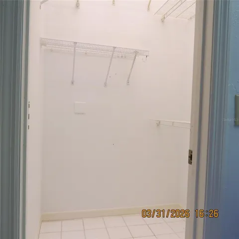 Large walk in with primary bedroom
