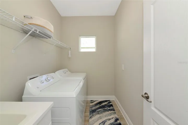 Laundry room with utility sink