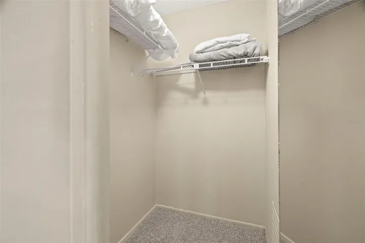 Primary Bedroom walk-in closet