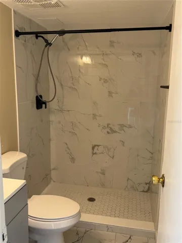 Updated bathroom with tile shower