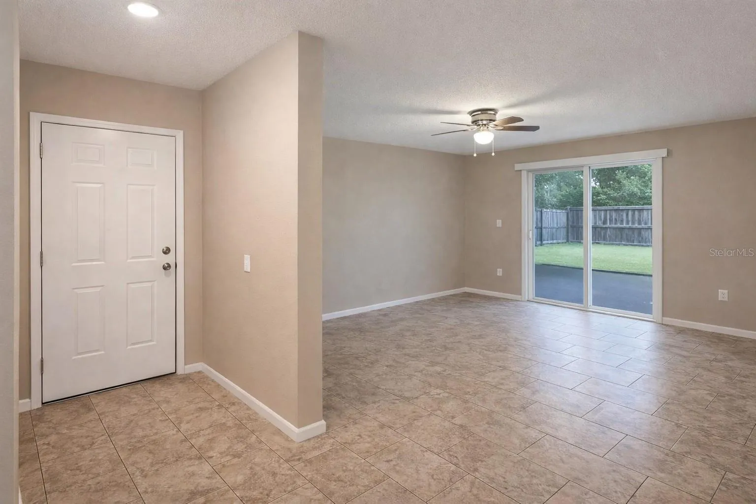 Bright entry leading into spacious living area