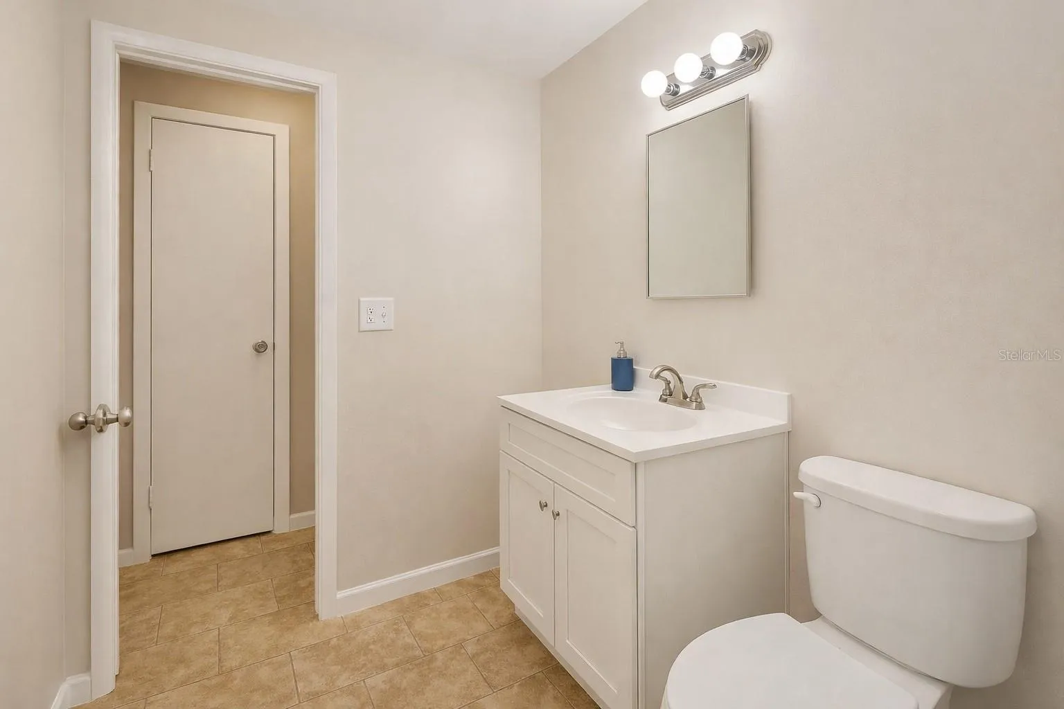 Clean and functional bathroom with updated vanity