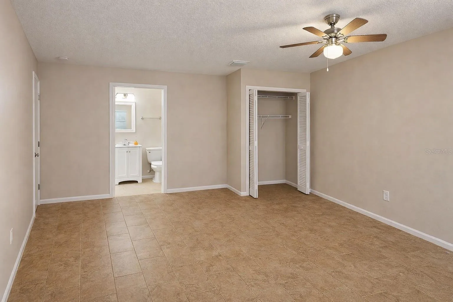 Comfortable primary bedroom
