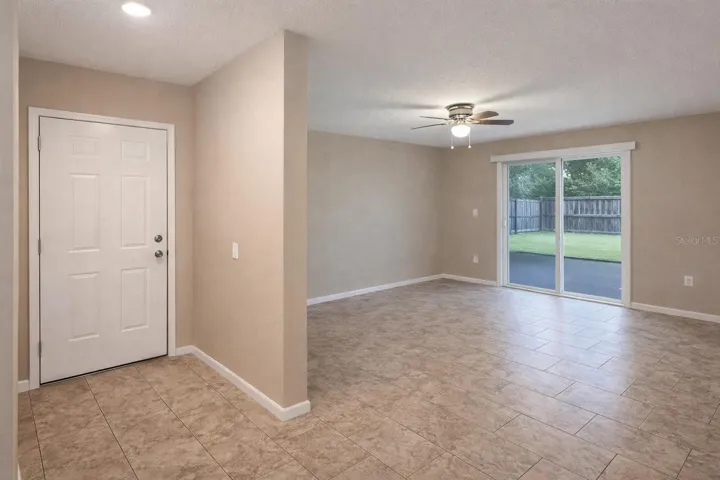 Bright entry leading into spacious living area