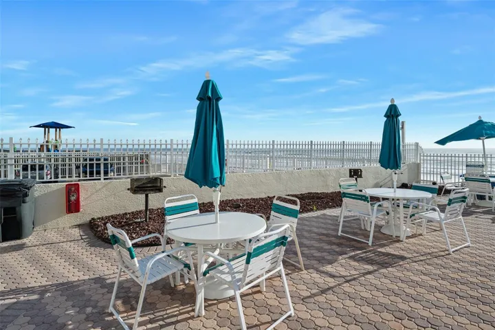 More tables and chairs, barbecue grills
