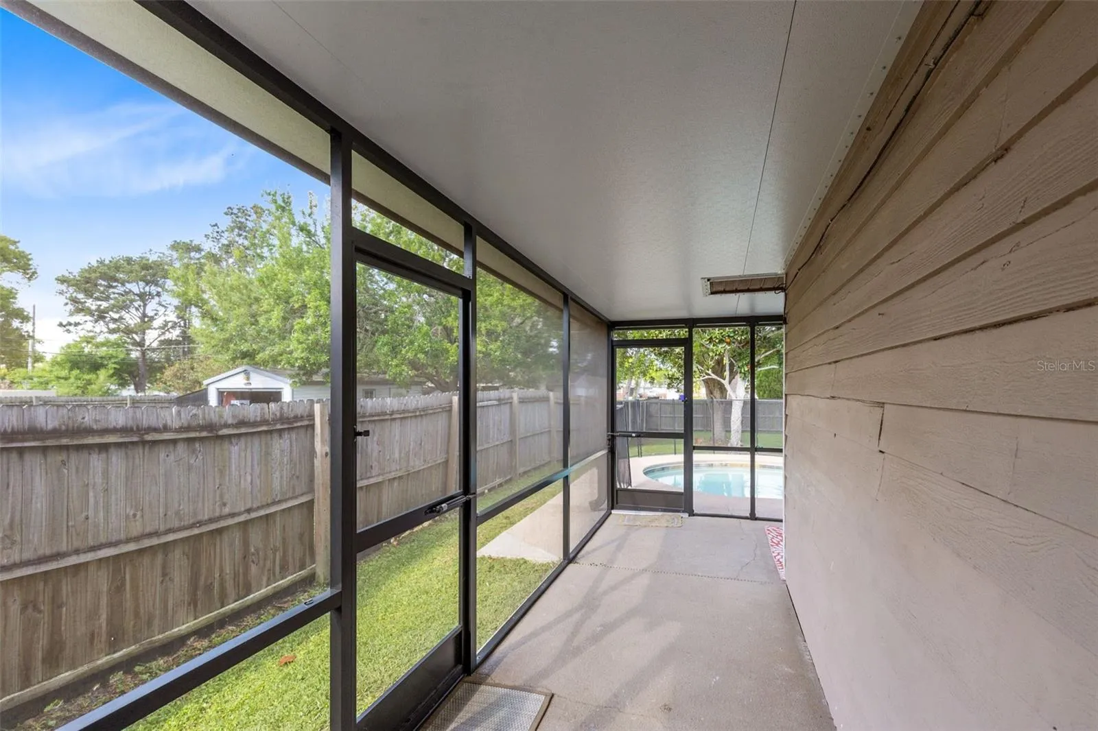 Wrap-around screened-in porch