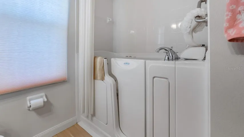 2nd Bathroom With Walk in Tub Newer Cabinets and Granite Counter Tops