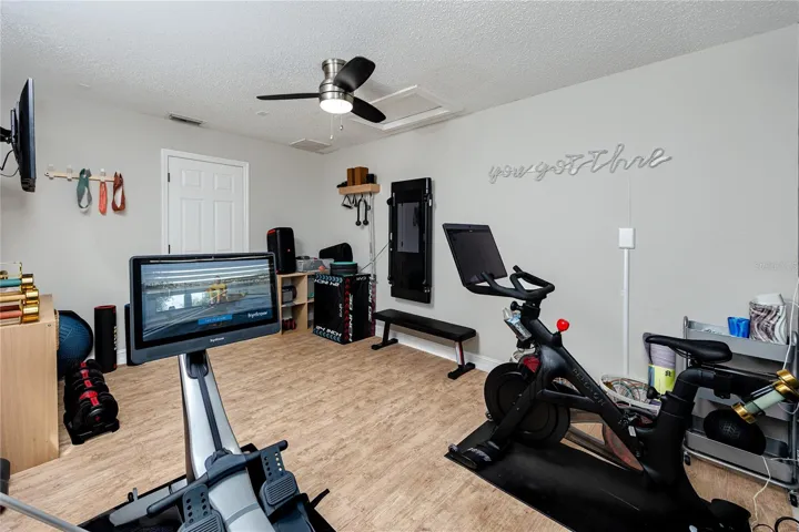 Bonus room off the pool currently used as a gym, but has lots of possibilities.