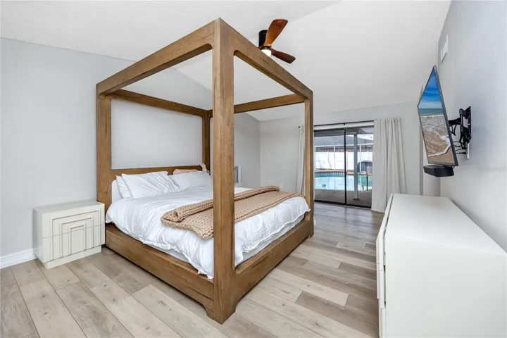 Owner's ensuite with double walk in closets, two additional closets, and a full bath. Access to the lanai too!
