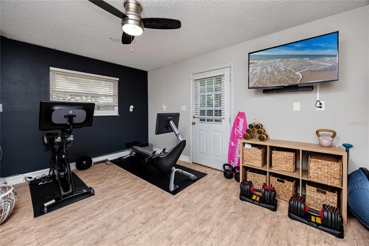 Bonus room off the pool currently used as a gym, but has lots of possibilities.
