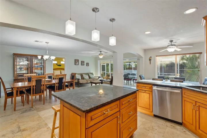 Dining area in front and breakfast table by the windows