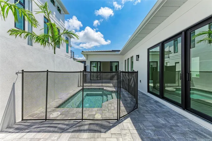 **The pool now has a screened lanai