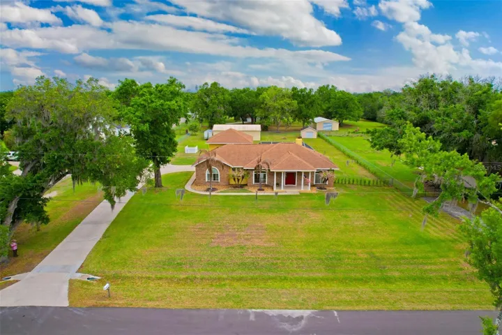 Aerial view of home and property looking north.