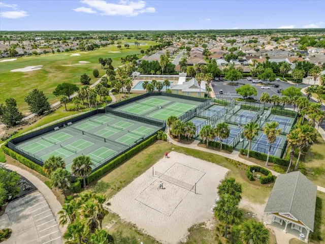 Resort-style recreation complex featuring tennis, pickleball, and sand volleyball courts just minutes from home.
