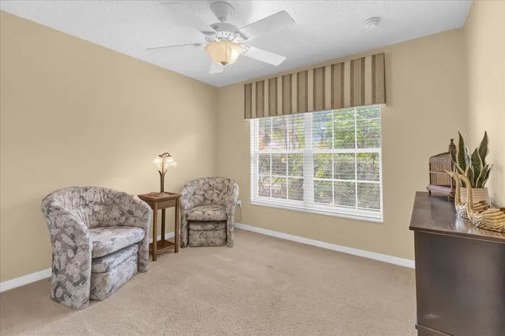 Versatile flex space perfect for a home office, reading room, or hobby retreat.