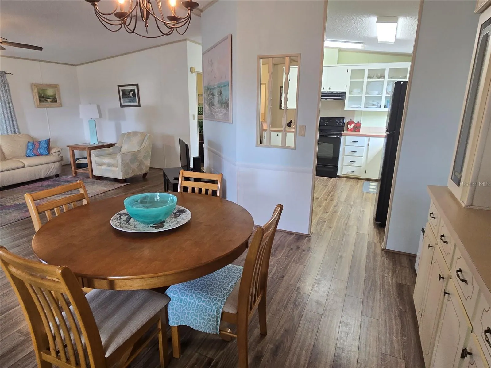Dining room opens to kitchdn