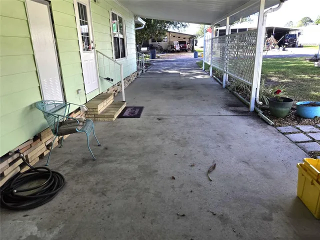 Carport has room for two