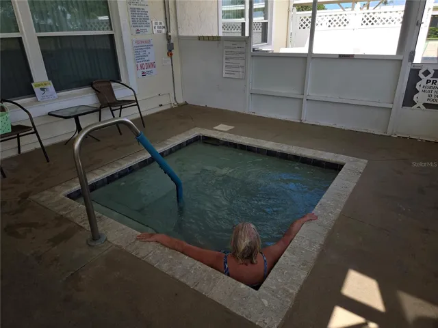 Hot tub is in screened room!