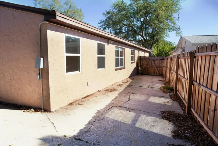 side of house in back yard. lots of space