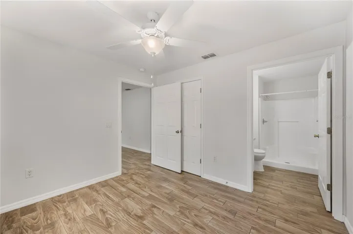Bedroom #1 - entrance to the ensuite bath and door to the walk-in closet