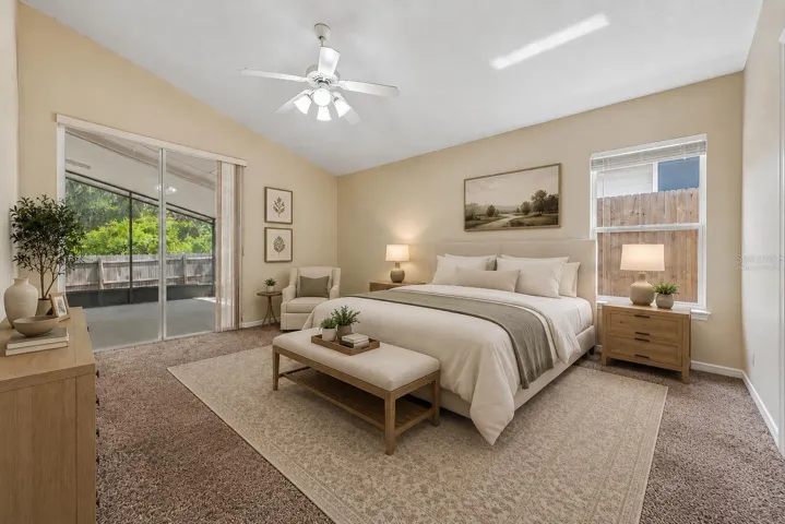 Virtually Staged. Primary bedroom with access to Lanai