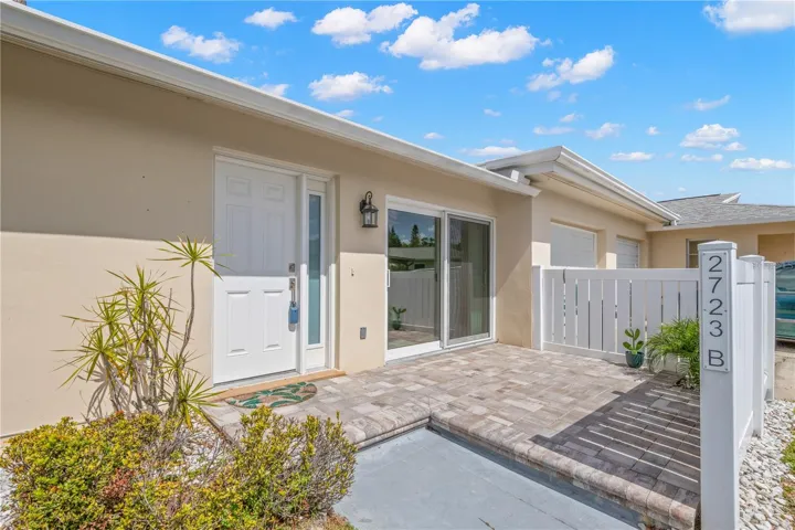 front entrance with  beautiful paved porch with fence and fenced in