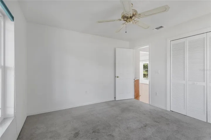 Guest Bedroom 1 is set off main living area.  Spacious in nature to appoint with large furniture, et al.