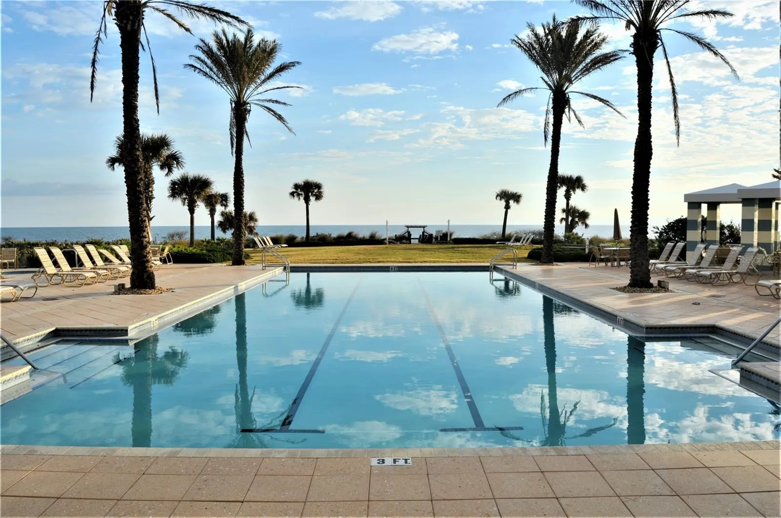 Oceanside pool with beach walk over.