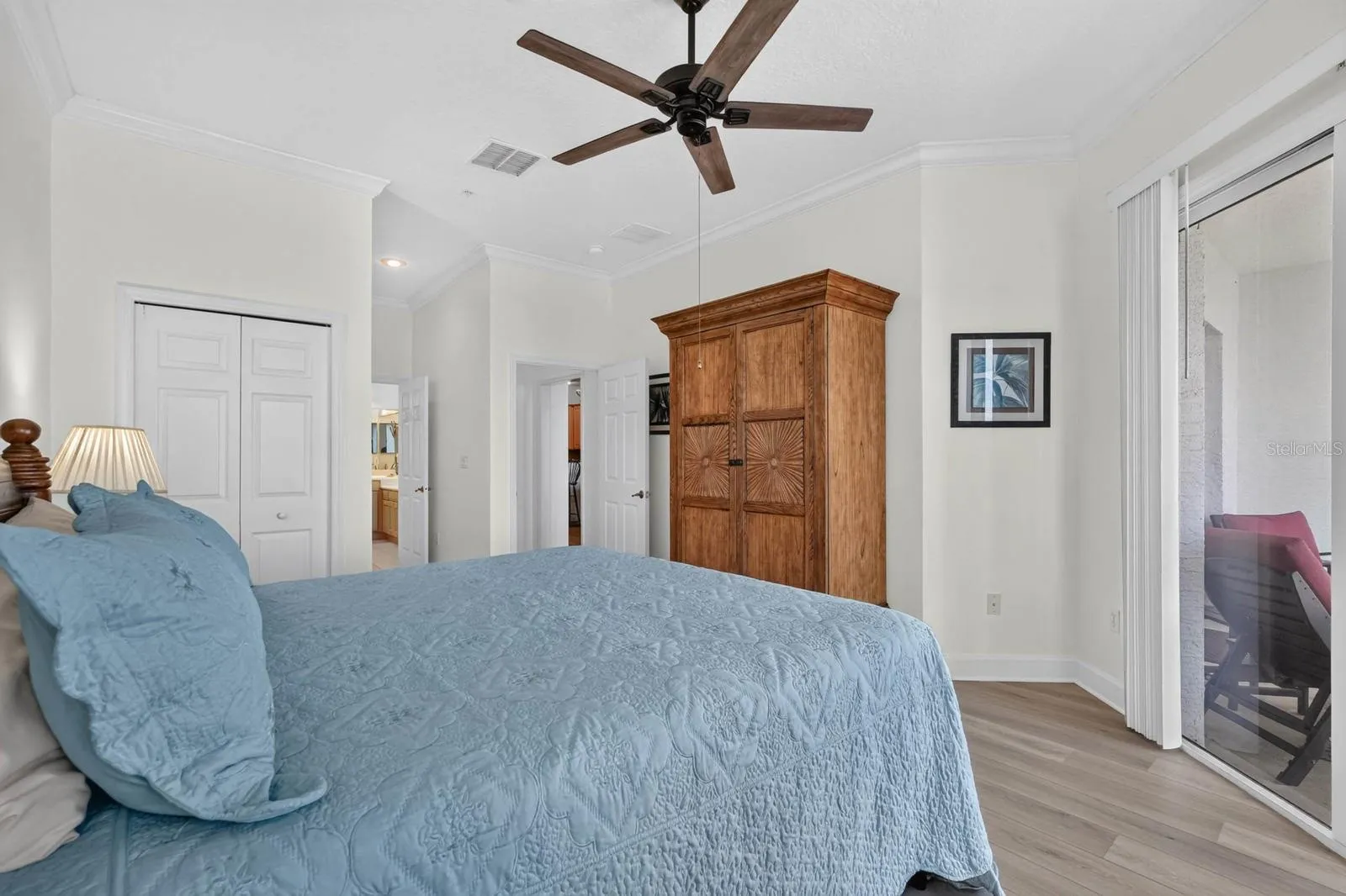 Primary bedroom private balcony entrance with fantastic beach view.