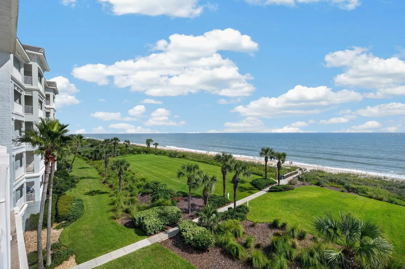 Balcony view, north and beach walkover just steps away.