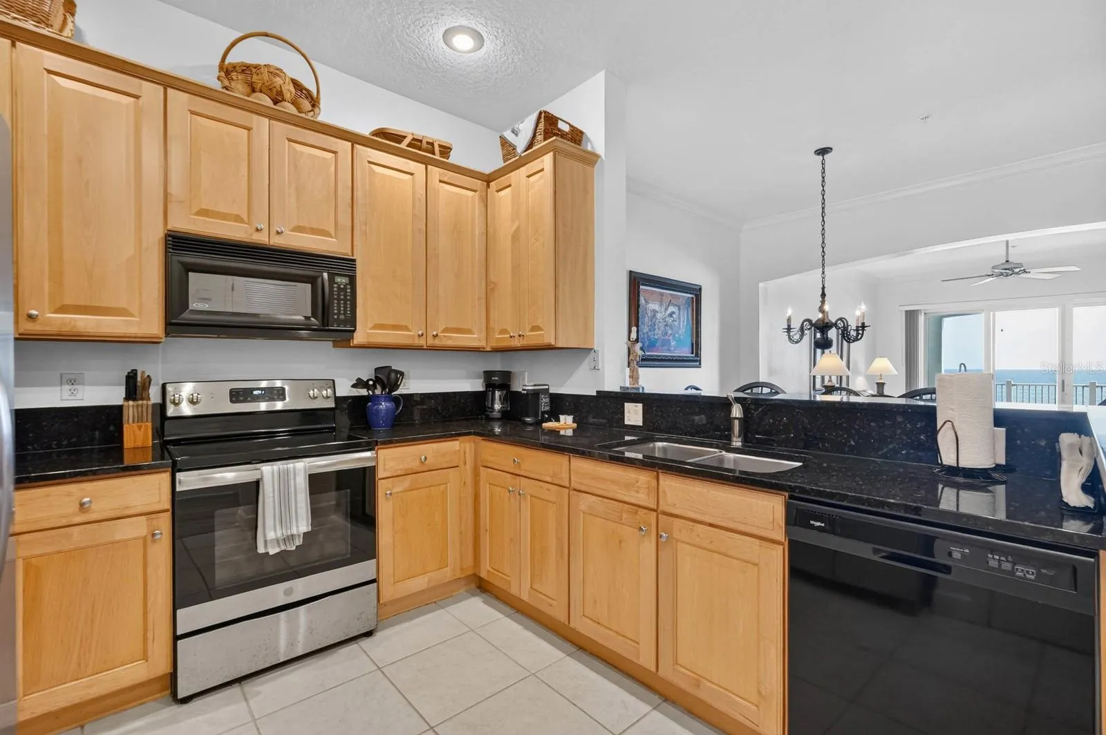 Range, microway, refrigerator and all the utensils for a gormet meal.