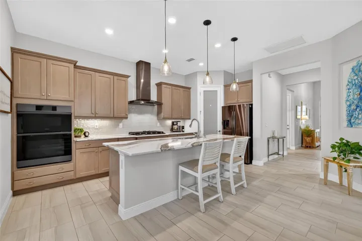 The kitchen is beautifully outfitted with 42-inch soft close cabinets and drawers.