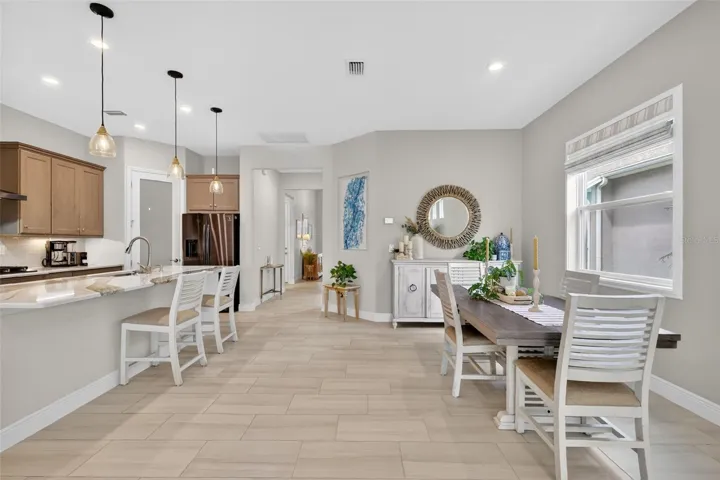 Proximity to the kitchen means take your pick, breakfast at the bar, buffets or formal meals, this dining space has it all.